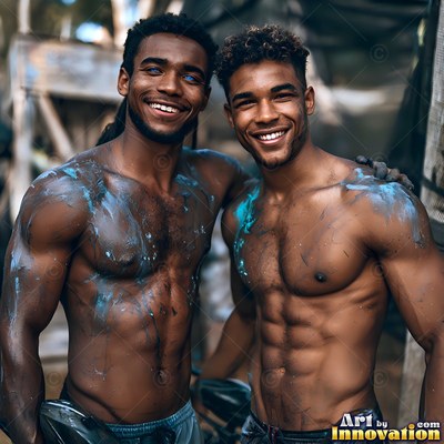 Two smiling bare-chested men stand together with blue paint smeared on their chests