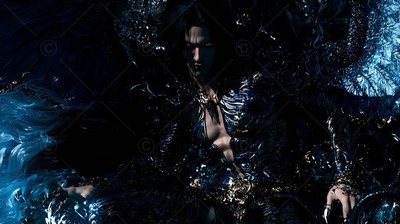Facing forward in deep shadow, a dark-haired man wears metallic armor
