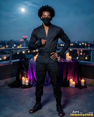 Posing on a rooftop by candlelight, a man wears an all-black ninja outfit and mask