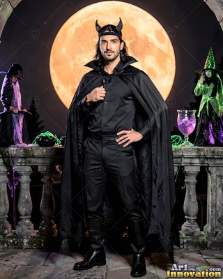 A man in a black devil costume stands on a stone balcony under a yellow full moon