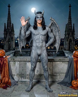 On a rooftop at night, a cheerful man waves dressed in a gray gargoyle costume