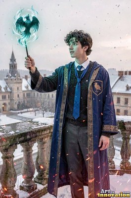 On a snowy castle balcony, a young man raises a wand to cast a blue raven spirit