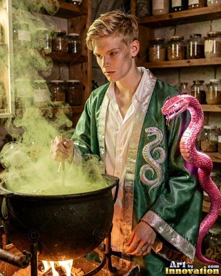 Cold precision on his face as a young dark mage summons venomous serpents under a stormy sky.