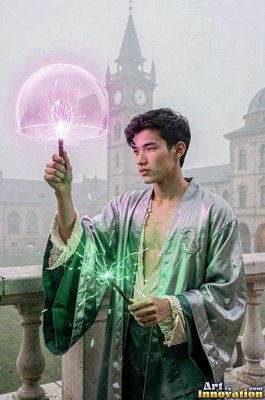 A man holds two wands producing pink electric light and green sparks outdoors