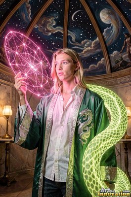 Blond man wearing a long green robe holding a pink circle beside a yellow snake