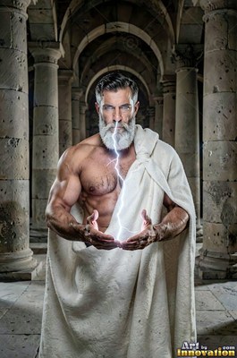 A muscular man who has a beard in a white robe holds lightning between his hands