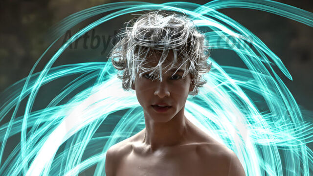 Abstract Male Art, AI photos of handsome shirtless men dancing with Light Rays, colorful art in motion. Guys dancing with radiant light rays that wrap around his body in flowing patterns, emphasizing his movements and adding a sense of ethereal fluidity. The designs appear weightless and almost sculptural, creates a striking contrast against the backgrounds making him the center of a cosmic dance, with energy and elegance. AI-generated abstract art HD photos featuring handsome, sexy, shirtless, men, boys, lads, dancing with colorful light rays, dynamic, interactive. Combining elements of realism with surreal abstract qualities, showcasing the potential of AI in artistic expression.