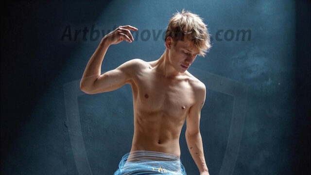 Abstract Male Art, AI photos of handsome shirtless men dancing with Light Rays, colorful art in motion. Guys dancing with radiant light rays that wrap around his body in flowing patterns, emphasizing his movements and adding a sense of ethereal fluidity. The designs appear weightless and almost sculptural, creates a striking contrast against the backgrounds making him the center of a cosmic dance, with energy and elegance. AI-generated abstract art HD photos featuring handsome, sexy, shirtless, men, boys, lads, dancing with colorful light rays, dynamic, interactive. Combining elements of realism with surreal abstract qualities, showcasing the potential of AI in artistic expression.