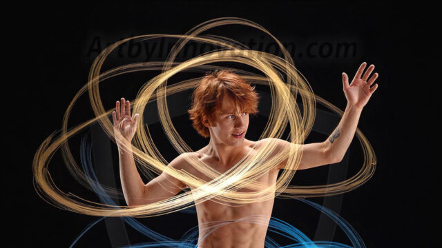 Abstract Male Art, AI photos of handsome shirtless men dancing with Light Rays, colorful art in motion. Guys dancing with radiant light rays that wrap around his body in flowing patterns, emphasizing his movements and adding a sense of ethereal fluidity. The designs appear weightless and almost sculptural, creates a striking contrast against the backgrounds making him the center of a cosmic dance, with energy and elegance. AI-generated abstract art HD photos featuring handsome, sexy, shirtless, men, boys, lads, dancing with colorful light rays, dynamic, interactive. Combining elements of realism with surreal abstract qualities, showcasing the potential of AI in artistic expression.