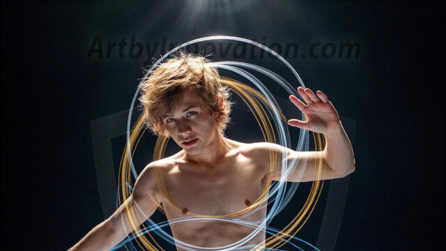 Abstract Male Art, AI photos of handsome shirtless men dancing with Light Rays, colorful art in motion. Guys dancing with radiant light rays that wrap around his body in flowing patterns, emphasizing his movements and adding a sense of ethereal fluidity. The designs appear weightless and almost sculptural, creates a striking contrast against the backgrounds making him the center of a cosmic dance, with energy and elegance. AI-generated abstract art HD photos featuring handsome, sexy, shirtless, men, boys, lads, dancing with colorful light rays, dynamic, interactive. Combining elements of realism with surreal abstract qualities, showcasing the potential of AI in artistic expression.