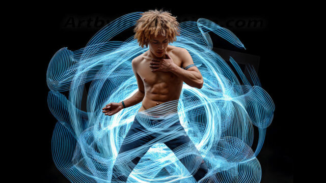 Abstract Male Art, AI photos of handsome shirtless men dancing with Light Rays, colorful art in motion. Guys dancing with radiant light rays that wrap around his body in flowing patterns, emphasizing his movements and adding a sense of ethereal fluidity. The designs appear weightless and almost sculptural, creates a striking contrast against the backgrounds making him the center of a cosmic dance, with energy and elegance. AI-generated abstract art HD photos featuring handsome, sexy, shirtless, men, boys, lads, dancing with colorful light rays, dynamic, interactive. Combining elements of realism with surreal abstract qualities, showcasing the potential of AI in artistic expression.