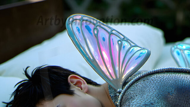 Brought to life through AI, Capturing the Pristine and Elusive Male Fairy. Imagine a realm where handsome shirtless men & boys possess enormous, shimmering crystal wings, vibrant and radiant, capturing and reflecting the light of the environment in a mesmerizing way, and adding a touch of mystery to their intense visage. Outdoors in a fantasy mysterious enchanted realm.