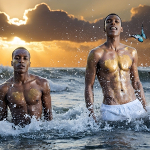 The Beautiful & Handsome Men Art Collection, A high-resolution photograph of two handsome best friends, half submerged in water, covered in body paint. Butterfly's flying about, as they spend time together, with a smile on their faces.
