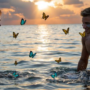 The Beautiful & Handsome Men Art Collection, A high-resolution photograph of two handsome best friends, half submerged in water, covered in body paint. Butterfly's flying about, as they spend time together, with a smile on their faces.