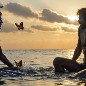 The Beautiful & Handsome Men Art Collection, A high-resolution photograph of two handsome best friends, half submerged in water, covered in body paint. Butterfly's flying about, as they spend time together, with a smile on their faces.