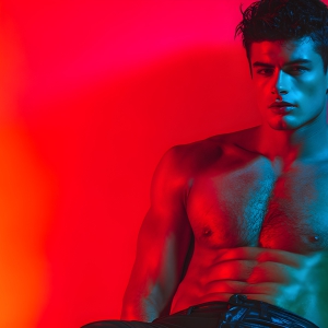 AI-generated art capturing men in a rainbow of colors creates a striking visual impact, blending surreal, vibrant, and high-fashion elements. Featuring artwork of beautiful, shirtless, muscular men embellished with or surrounded by a vibrant rainbow palette, evoking themes of pride, vitality, and artistic expression.