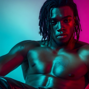AI-generated art capturing men in a rainbow of colors creates a striking visual impact, blending surreal, vibrant, and high-fashion elements. Featuring artwork of beautiful, shirtless, muscular men embellished with or surrounded by a vibrant rainbow palette, evoking themes of pride, vitality, and artistic expression.