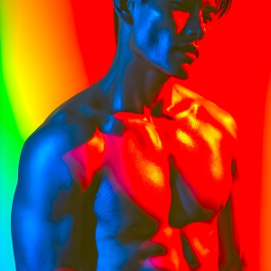 AI-generated art capturing men in a rainbow of colors creates a striking visual impact, blending surreal, vibrant, and high-fashion elements. Featuring artwork of beautiful, shirtless, muscular men embellished with or surrounded by a vibrant rainbow palette, evoking themes of pride, vitality, and artistic expression.