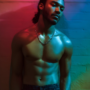 AI-generated art capturing men in a rainbow of colors creates a striking visual impact, blending surreal, vibrant, and high-fashion elements. Featuring artwork of beautiful, shirtless, muscular men embellished with or surrounded by a vibrant rainbow palette, evoking themes of pride, vitality, and artistic expression.