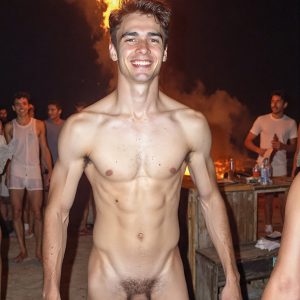Bad Boys Naked Beach Party II. A full-body composition of a nude young man standing near a crackling bonfire, on a serene moonlit night at the beach. The gentle glow of the flames, flickers across his shinny wet body, catching his contours, and highlighting his muscular physique and handsome face. People everywhere partying, dancing to the music, having a good time together, naked, and free.