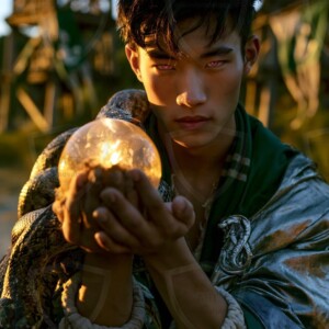 AI-generated wizards of the serpent house handsome shirtless mages of the wizard academy conjuring demonic snakes in dark cinematic UHD fantasy art.